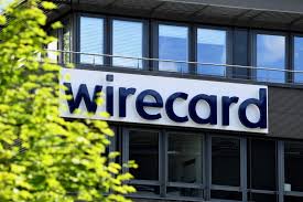 The logo of german bank deutsche bank hangs over one of the bank's branches on april 27, 2015 in berlin, germany. Germany Drops Probe Of Former Deutsche Bank Board Member Over Wirecard Reuters