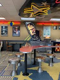 Many websites do not allow direct links to their images (as it leeches their bandwidth). This Movie Themed Burger King In Brooklyn New York Seems Completely Untouched Since The 90 S 90sdesign