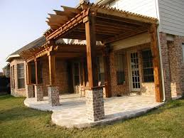 The posts are elevated 1 above the concrete. Love The Brick Cedar Beams For The Home Pinterest Cedar Beams Cedar Columns House Exterior