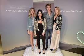 Another by @madpics styled by @derek_beckman Lucky Blue Smith Pyper America Starlie And Daisy Clementine Of The Atomics Perform At The Launch Of The H M Loves Coachella Collection In Times Square