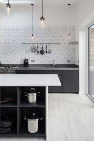 Elongated hexagon tile back splash adds elegance to this transitional space. 15 Edgy Hexagon Tile Kitchen Backsplashes Shelterness