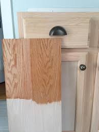 The set includes a drill/driver, impact driver, reciprocating saw, circular saw, oscillating tool, and task light. Kitchen Renovation Unfinished Oak Cabinets