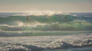 Is south africa's leading commission dyeing, printing and finishing plant based in umbogintwini, a few kilometres to the south of durban. Surfers Ride A Big Wave In Windy Conditions Stock Image Image Of Water Ride 101092447