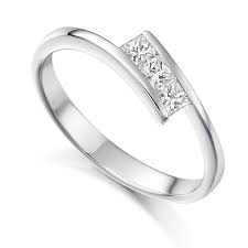 Wrap the piece of paper around your knuckle, which is the largest point the ring will have to be able to get over. 3 Stone Tension Set Princess Cut Diamond Ring