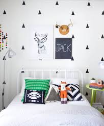 Gray in the kids' bedroom might seem like a drag for some, but once you start taking into account the bigger picture, you will realize that it is a great choice. Trendy Kids Decor On A Budget Black On White Wall Decals Apartment Therapy