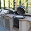 Outdoor kitchen with charcoal grill and smoker. 3