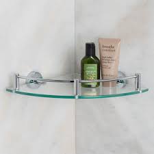 Floating glass shelves can help make the most of the frequently limited bathroom space. Bristow Tempered Glass Corner Shelf Glass Bathroom Shelves Glass Shelves In Bathroom Glass Shower Shelves