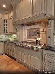 We painted the island gray to match the wall color and went with solid white cabinets. Taupe And Greige And Grey Kitchens Kitchen Trends 2015 Petite Haus