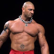Bautista stands and has him take a photo with his phone. Untold Stories And Meanings Behind Dave Bautista S Tattoos Tattoo Me Now