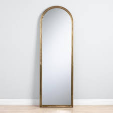 House wives/young damsels and their lifestyle is always complimented by mirror each time they're set to go out or attending an occasion. Arched Gold Mirror World Market