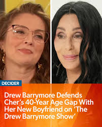 During today's episode of The #DrewBarrymoreShow, Drew Barrymore took to  her Drew's News segment to defend Cher's 40-year age gap with her new beau,  Alexander "AE" Edwards, a 36-year-old music executive. She