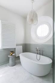 Modern Oval Bathtub With Gray Glass Subway Tiles Cottage Bathroom The cheapest offer starts at £15.