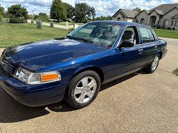 Image result for Light Ice Blue 2003 Crown Victoria