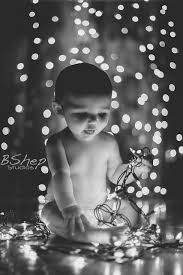 Baby Girl With Christmas Lights Baby Christmas Photos Baby Christmas Photography Christmas Light Photography
