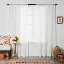 The scalloped hem is finished with an embellished embroidery in a complementary pattern. Embroidered Floral Sheer Curtain Panel White Opalhouse Target
