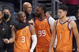 The family portrait (inset) includes sons c.j. Chris Paul Leads Suns Past Clippers 130 103 Into Nba Finals