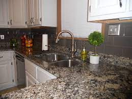 A kitchen backsplash is essential for protecting walls from all the messes cooking and cleaning can create. Mrsshayne S Image Granite Backsplash Backsplash Paint Cabinets White