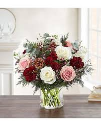 Pin By A Little Castle Flower Shop On Https Www Harlingenlittlecastle Com Christmas Flower Arrangements Christmas Flower Delivery Pink Flower Bouquet