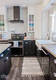 Pictures of white kitchen cabinets with black stainless appliances. Our Kitchen Makeover With Black Stainless Steel Appliances The Diy Mommy