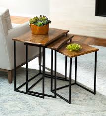 Made from solid mango wood with a natural finish, this rectangle coffee table is the epitome of sturdy wooden furniture. Live Edge Reclaimed Wood Nesting Tables Set Of 3 Vivaterra