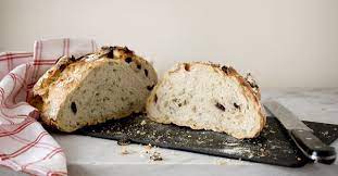 The Famous Ny Times No Knead Bread A Stack Of Dishes No Knead Bread Bread Baking