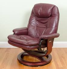 Make your small living room bigger and cozier by opting for a lighter toned carpet and furniture. Lot Art Burgundy Leather Reclining Chair By Palliser