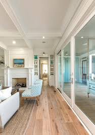Living Room With Patio Sliding Doors Mahshie Custom Homes Beach House Interior Design Beach House Interior Coastal Interiors