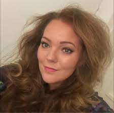 Mosaic wall with embedded teacups for a succulent garden