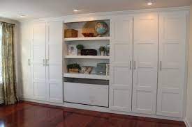 Living Room Cabinet Extraordinary Ikea Wall Cabinets With Brazilian Walnut Laminate Flooring Also Brushed Nickel Ikea Pax Wardrobe Build A Closet Ikea Wardrobe