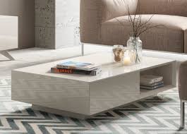 If you have a full sectional or long traditional couch, a rectangular coffee table offers optimal functionality and balance to your living room. Almada Rectangular Coffee Table Modern Coffee Tables