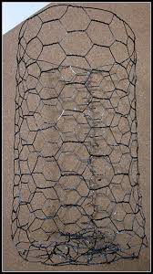 It's made of thin wire woven together to create hexagonal openings. A Diy Rusty Chicken Wire Solution Chicken Wire Sculpture Diy Chicken Wire Diy Chicken Wire