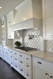 dark floors white cabinets granite