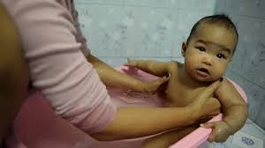 You can gently splash or pour warm water over your baby to keep them warm in the tub. Little Girl Bath Stock Video Footage Royalty Free Little Girl Bath Videos Pond5