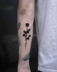 Rose tattoos are very popular nowadays, not only on women but surprisingly also on men. Solid Black Rose Tattoo By Loz Mclean Inked On The Left Forearm Black Rose Tattoos Rose Tattoos For Men Rose Tattoo Forearm