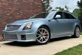 Image result for Glacier Blue 2013 Cadillac