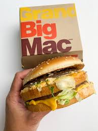 It's topped off with pickles, crisp shredded lettuce, finely chopped onion and american cheese for a 100% beef burger with a taste like no other. Mcdonald S Grand Big Mac 2021 Calories Price Ingredients Review