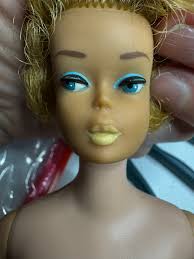 American Girl doll with thatched hair and dark face