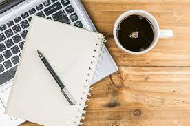 Home coffee bar for the home office. Laptop With Coffee Cup Notebook And Pen On Wooden Background Stock Photo Picture And Royalty Free Image Image 28002600