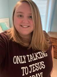 Visiting hometown, showing off shirt