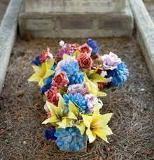 Image result for flower arrangements for graves. Protecting Silk Flowers At Gravesites Thriftyfun