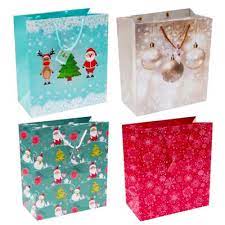 Free shipping on orders over $25 shipped by amazon. Assorted Large Christmas Gift Bags Pack Of 4 The Works