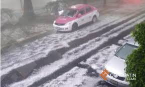 La noche de este miércoles se registró una fuerte granizada y lluvias con descargas eléctricas en diversas zonas de la ciudad de méxico. Granizada En Cdmx Aliviana Encierro