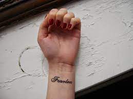 43 awesome leaves wrist tattoos; Fearless Tattoo On Wrist Inspired By Taylor Swift Tatoveringsideer