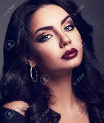 She had pale skin, long black hair and gray eyes with red bags around them. Beautiful Perfect Makeup Blue Eyes Woman With Long Black Curly Stock Photo Picture And Royalty Free Image Image 133415046