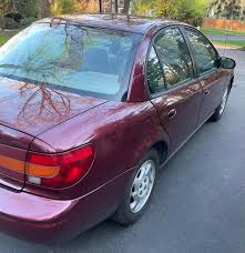 Image result for Bright Red 2001 Saturn