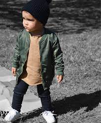 Toddler Boy Fashion Faded Green Leather Jacket Distressed Tan Shirt Black Distressed Jeans White Sneakers Kids Fashion Boy Kids Outfits Toddler Fashion