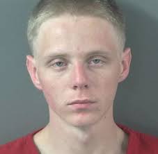 Man arrested for theft of purse in downtown parking lot