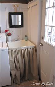 dressing up a mud room sink beneath