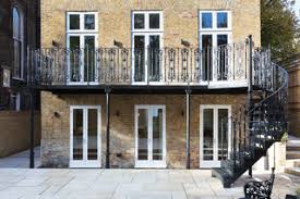 Metal garden art can liven up your yard and add color and character to your outdoor living space. London Garden Metal Balcony And Staircase Klassisch Balkon London Von British Spirals Castings Houzz