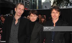The band playing live behind the screen were occasionally lit up but for the most the emphasis was the film and music. Pin On Suede